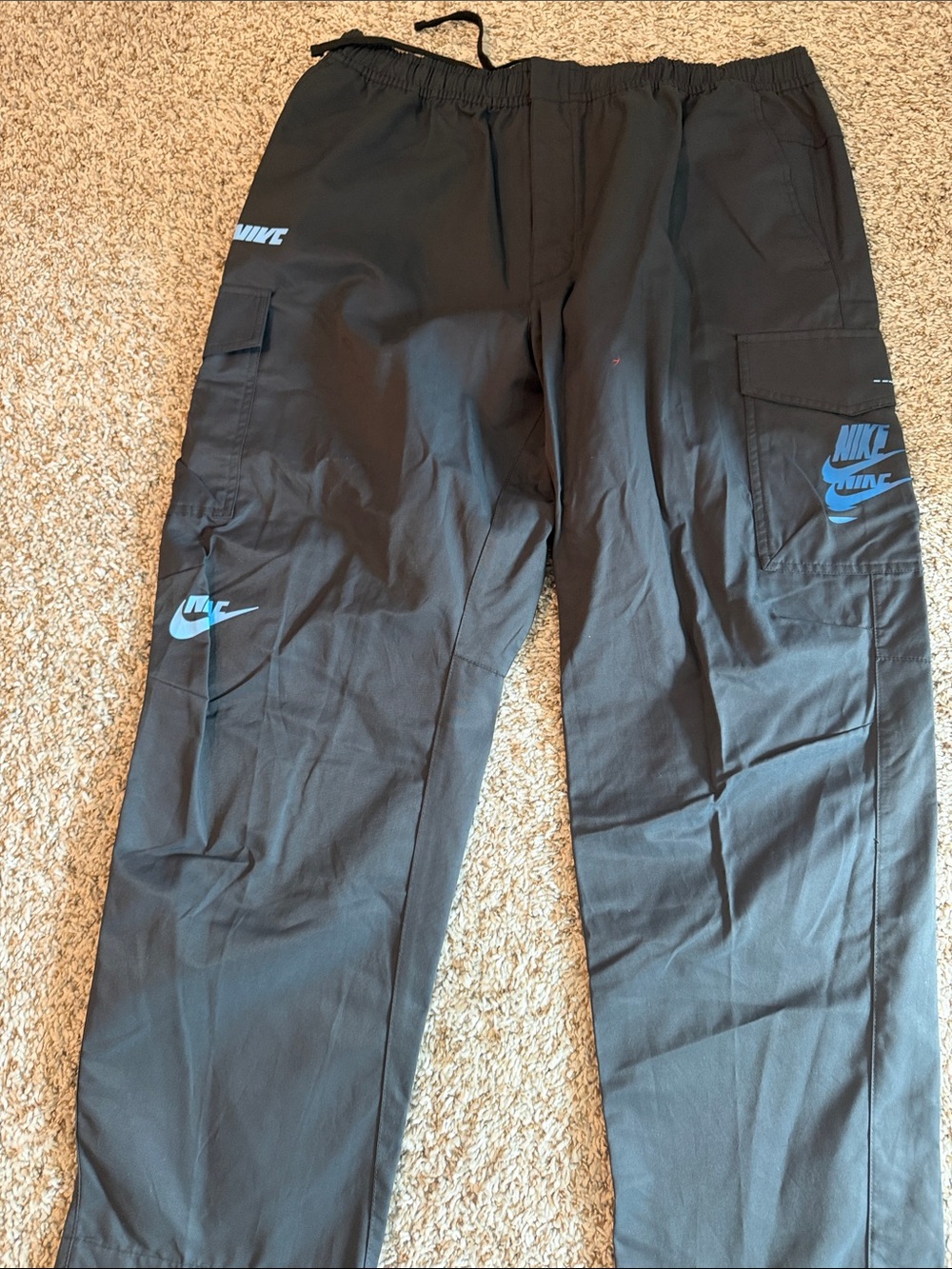 Nike Men’s Black Cargo Pants with Blue Logos